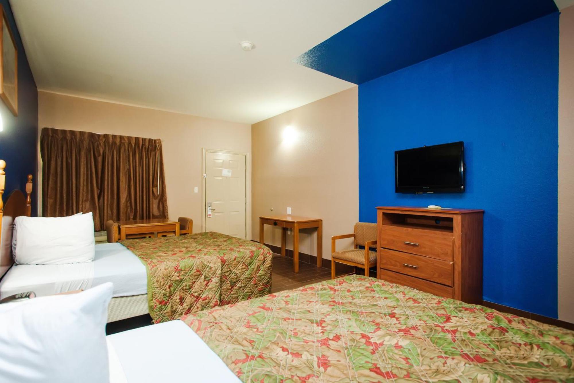 Scottish Inn & Suites Hankamer Rum bild
