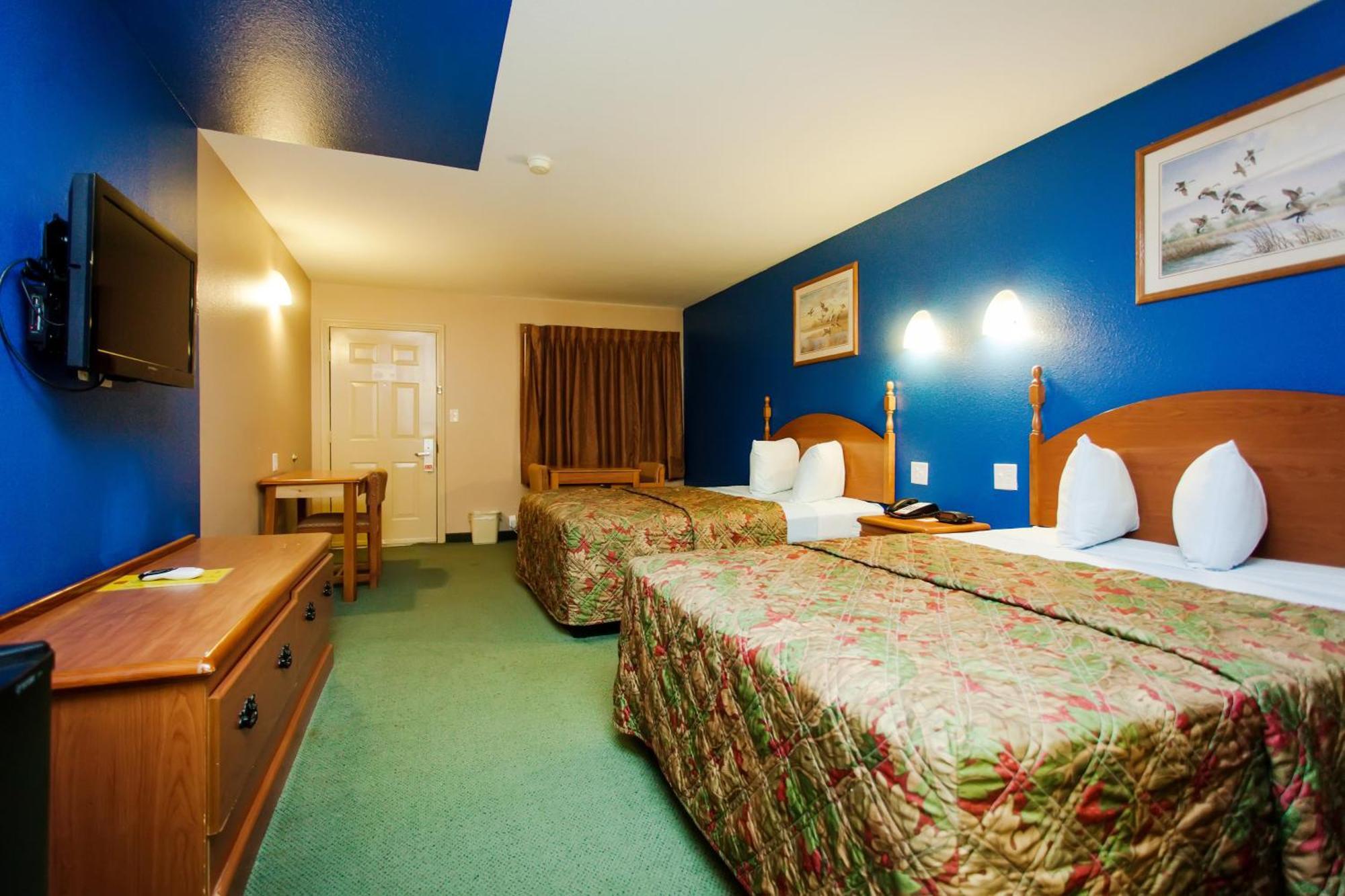 Scottish Inn & Suites Hankamer Rum bild