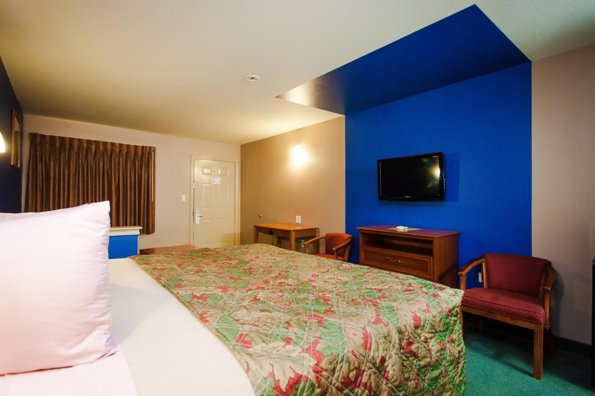 Scottish Inn & Suites Hankamer Rum bild