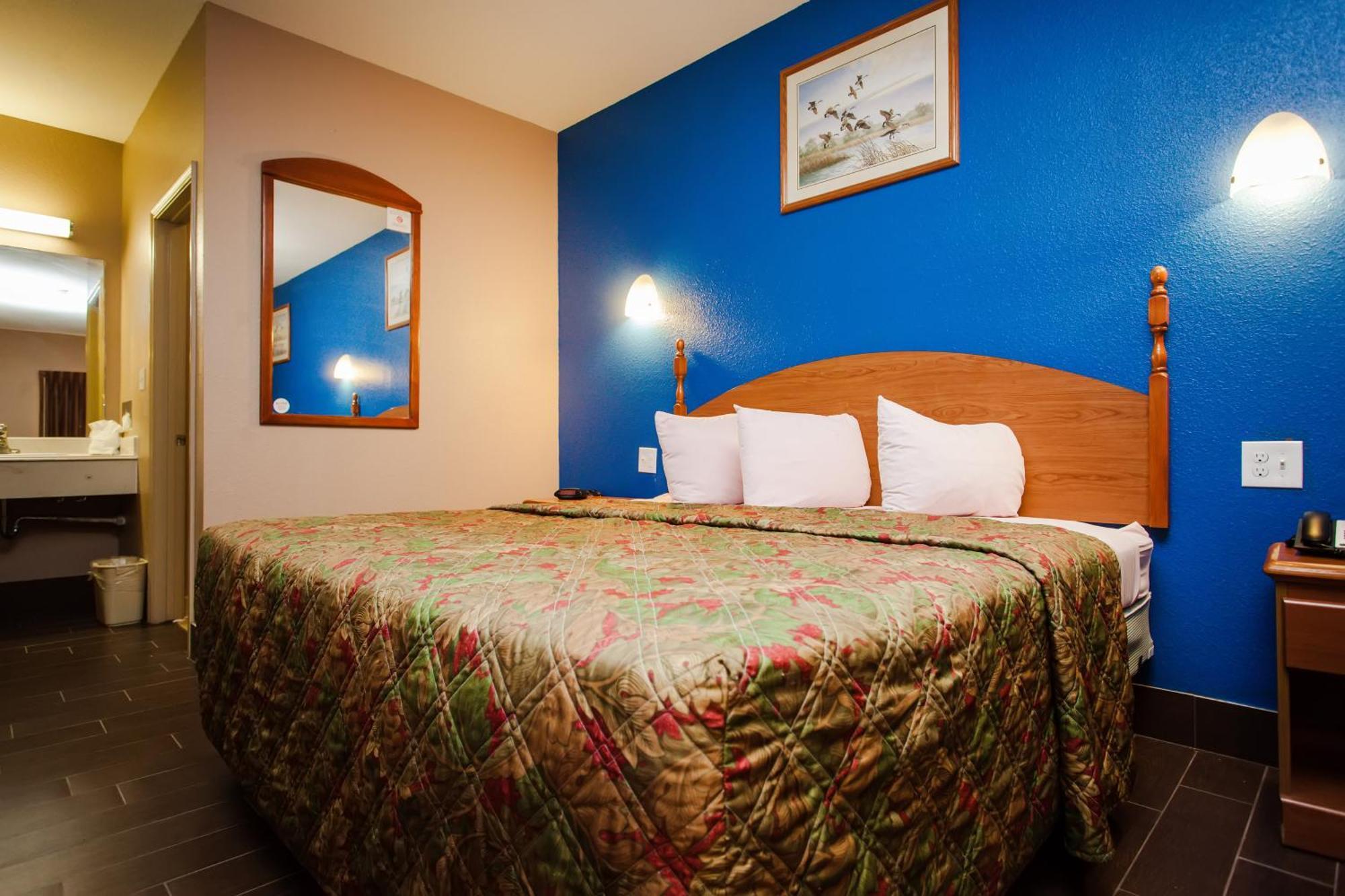Scottish Inn & Suites Hankamer Rum bild
