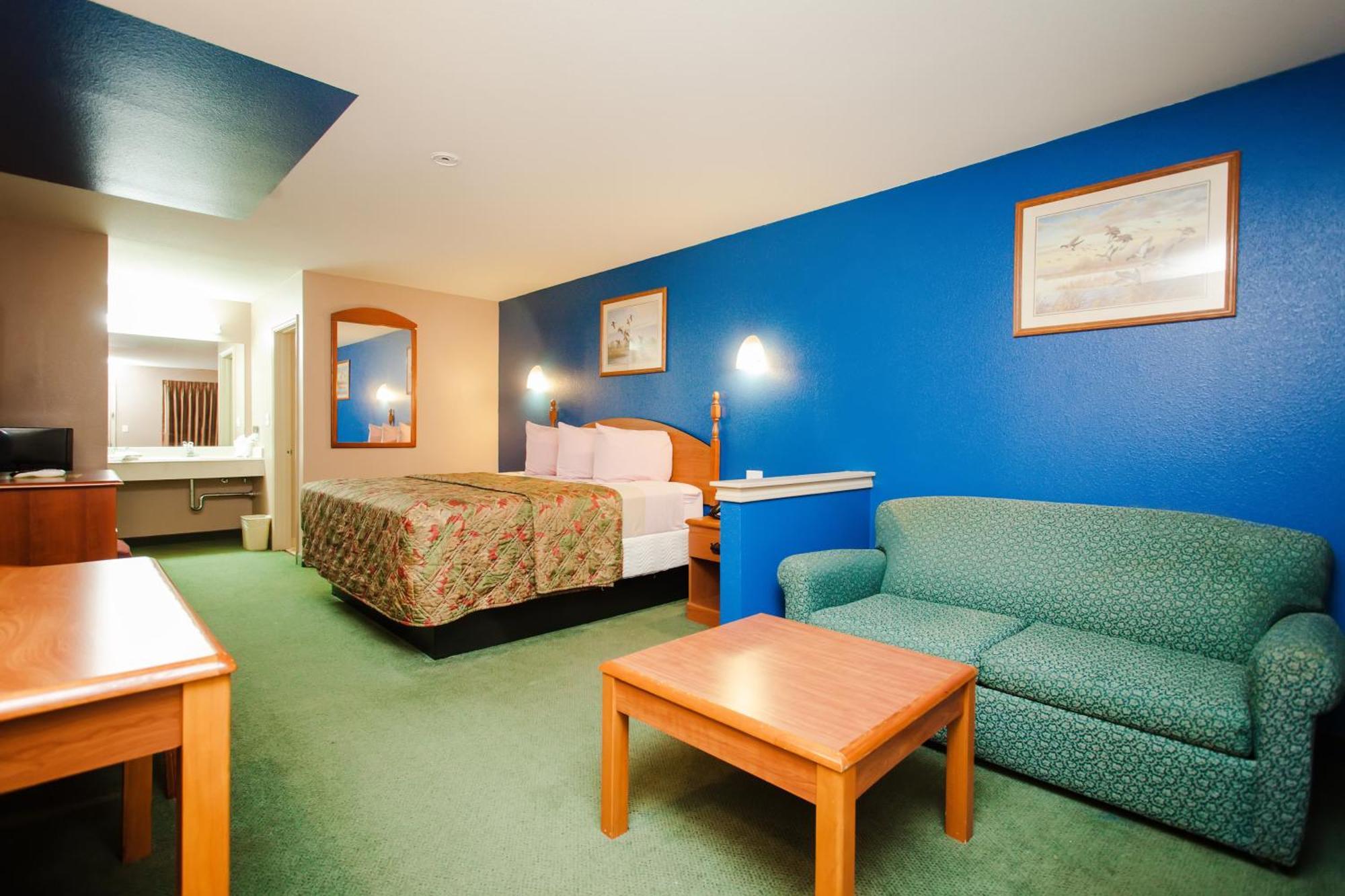 Scottish Inn & Suites Hankamer Rum bild