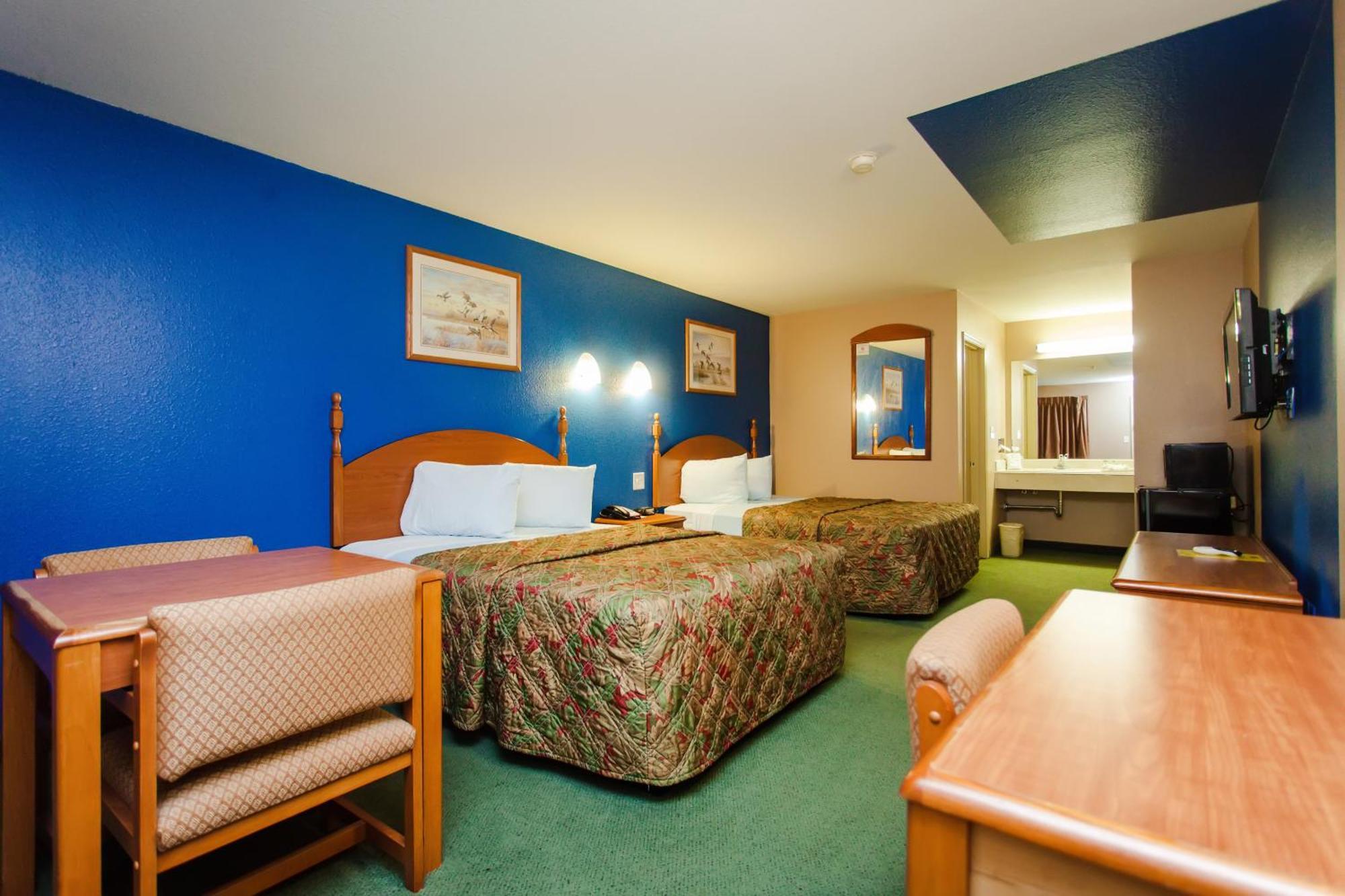 Scottish Inn & Suites Hankamer Rum bild